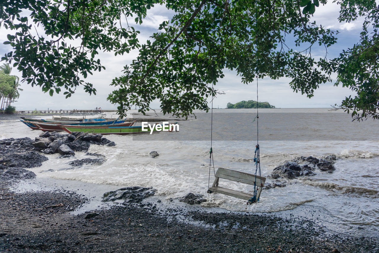 VIEW OF BEACH AGAINST SKY