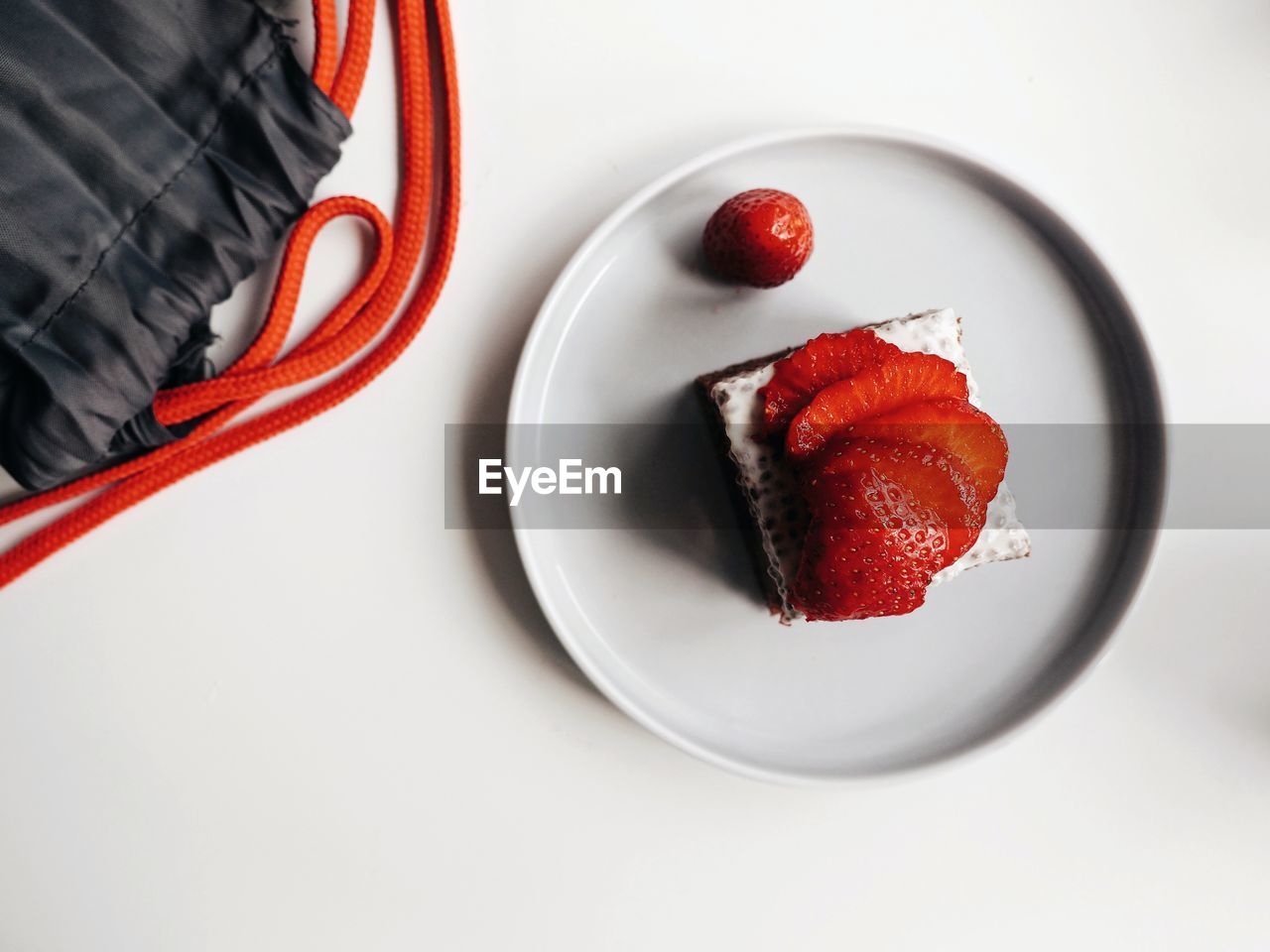 High angle view of strawberrie cake on table