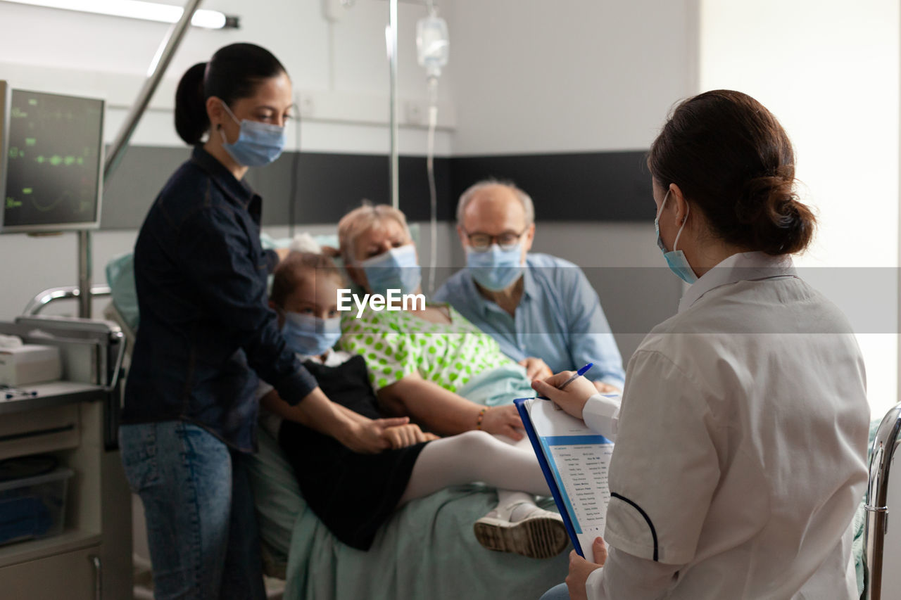 Group of people sitting in hospital