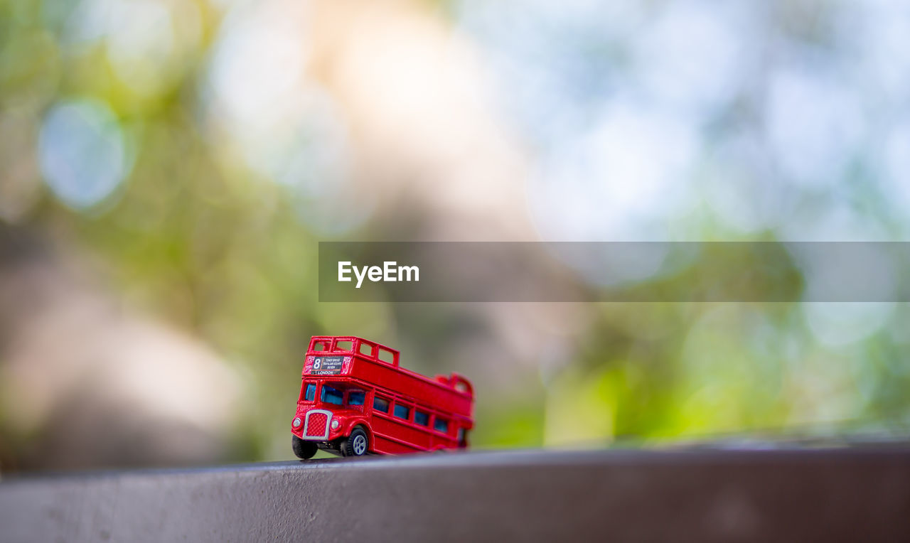 CLOSE-UP OF TOY ON TABLE