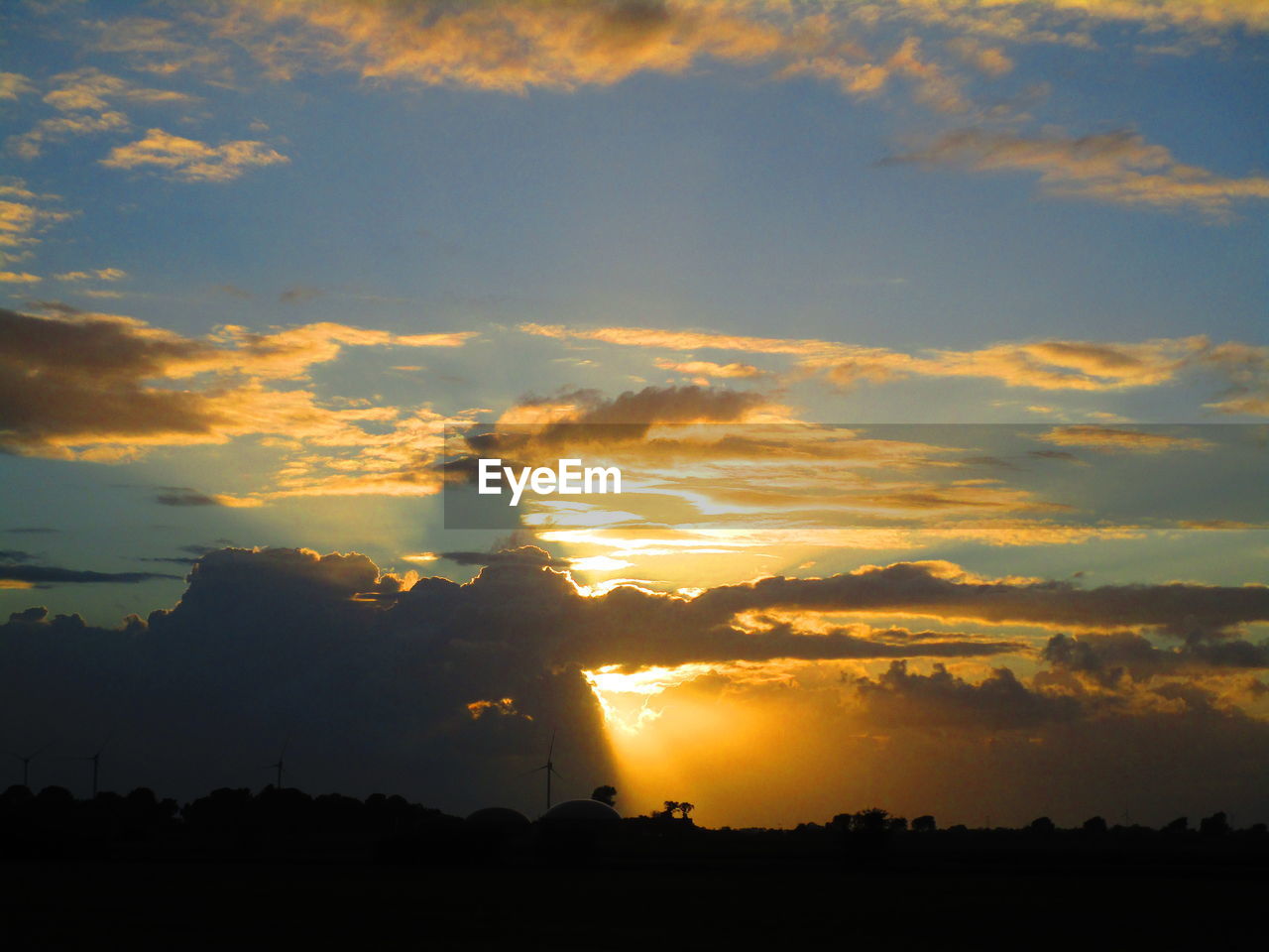 SCENIC VIEW OF SILHOUETTE LAND AGAINST SKY DURING SUNSET