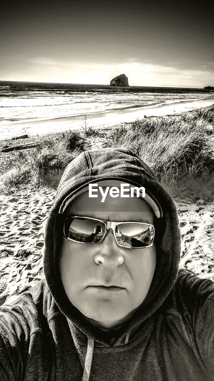 Man in sunglasses at beach