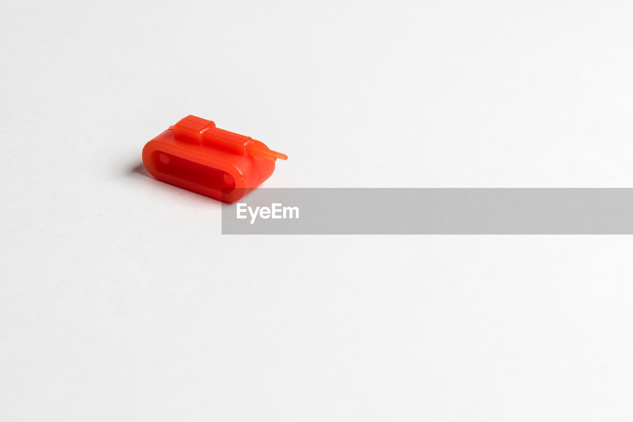 Close-up of toy tank on white background