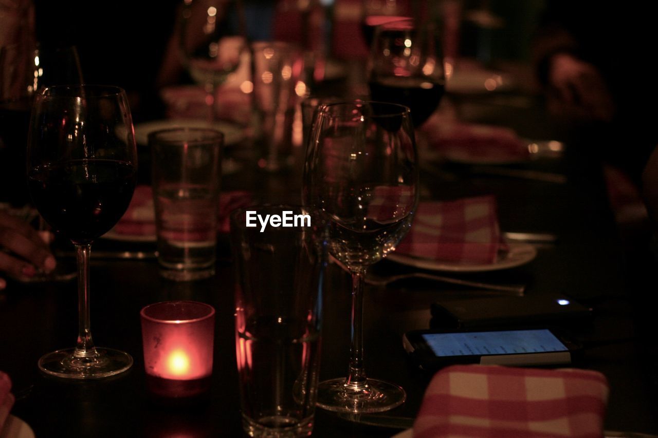 Close-up of wineglasses on table