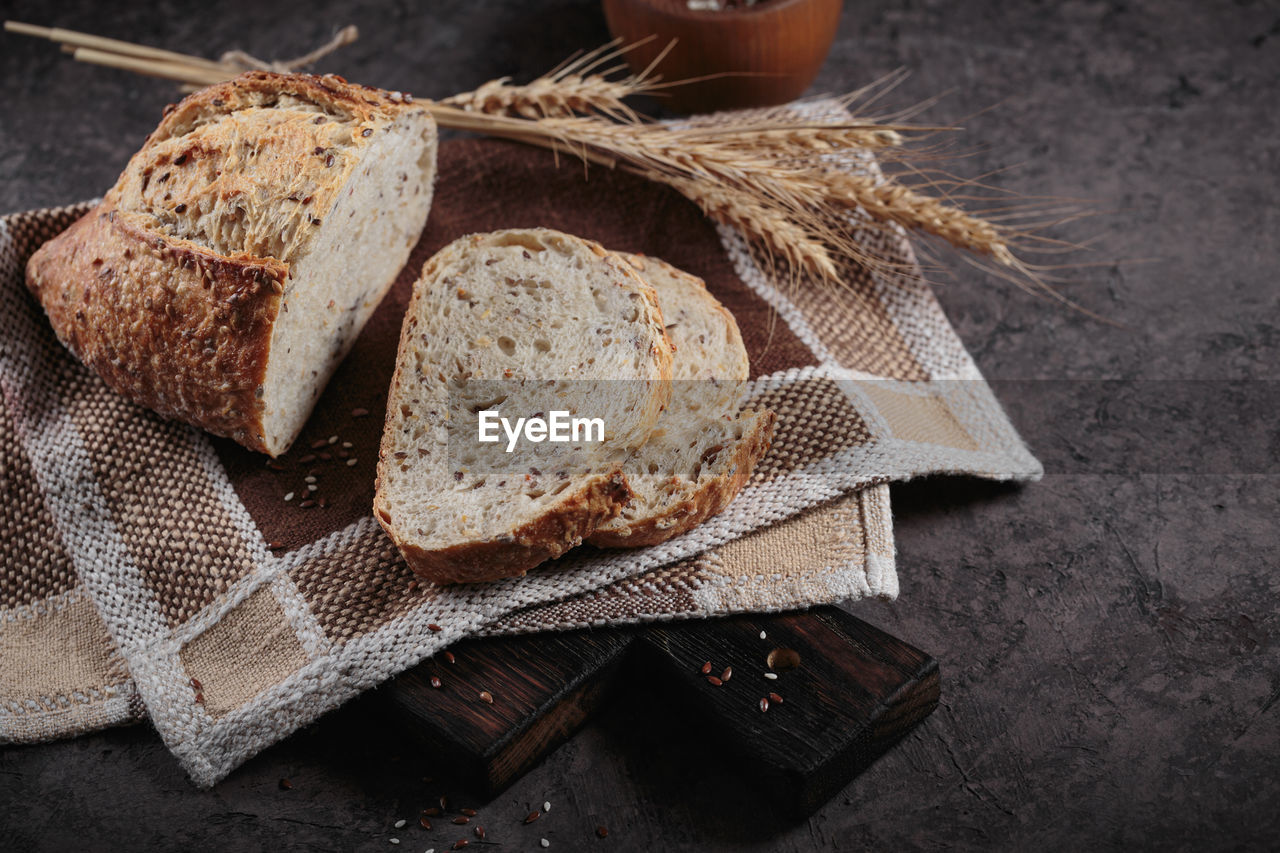 Sliced fresh baked whole grain bread with flax seeds