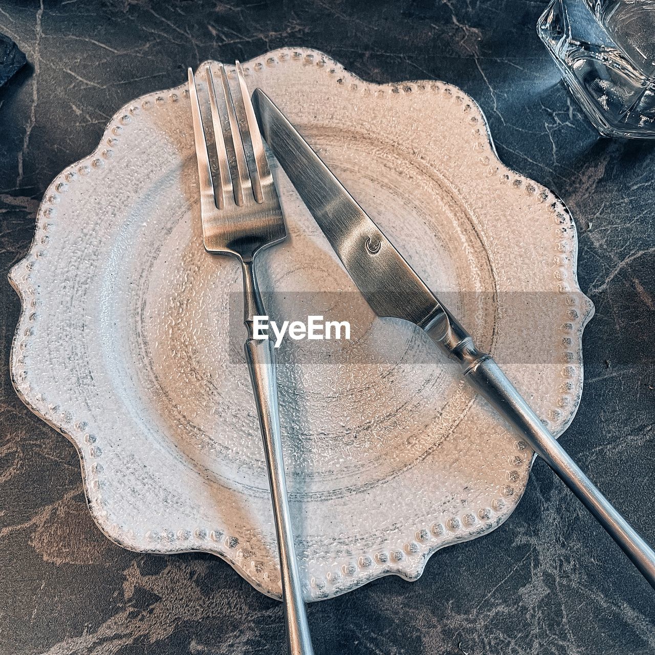 High angle view of fork and knife on table