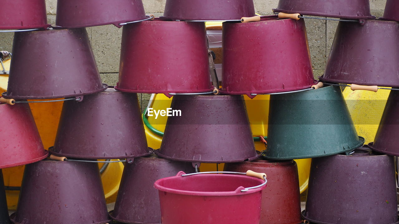 Full frame shot of multi colored containers stacked outdoors