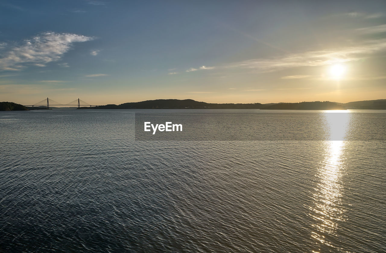 VIEW OF SEA AGAINST SKY DURING SUNSET