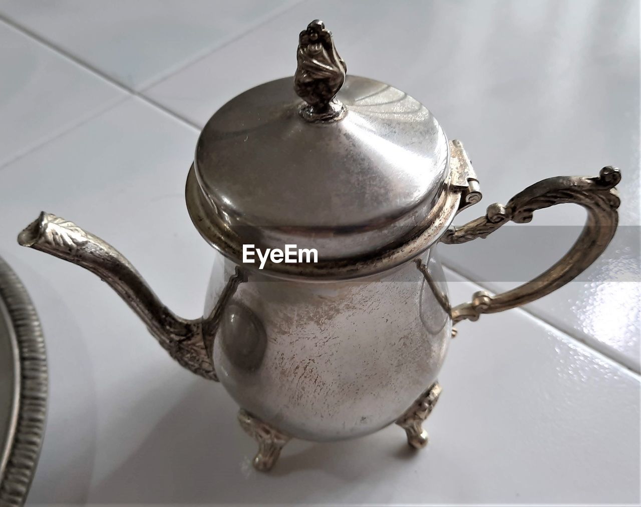 teapot, iron, kettle, indoors, household equipment, metal, food and drink, silver, kitchen utensil, tea, no people, drink, hot drink, stovetop kettle, handle, tea kettle, close-up, still life