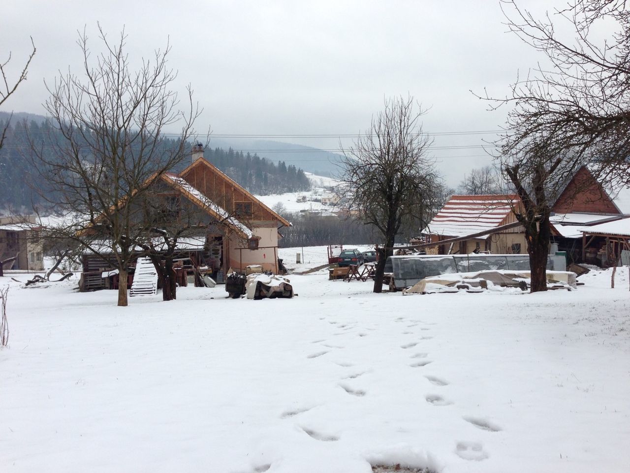 HOUSES ON SNOW COVERED MOUNTAIN