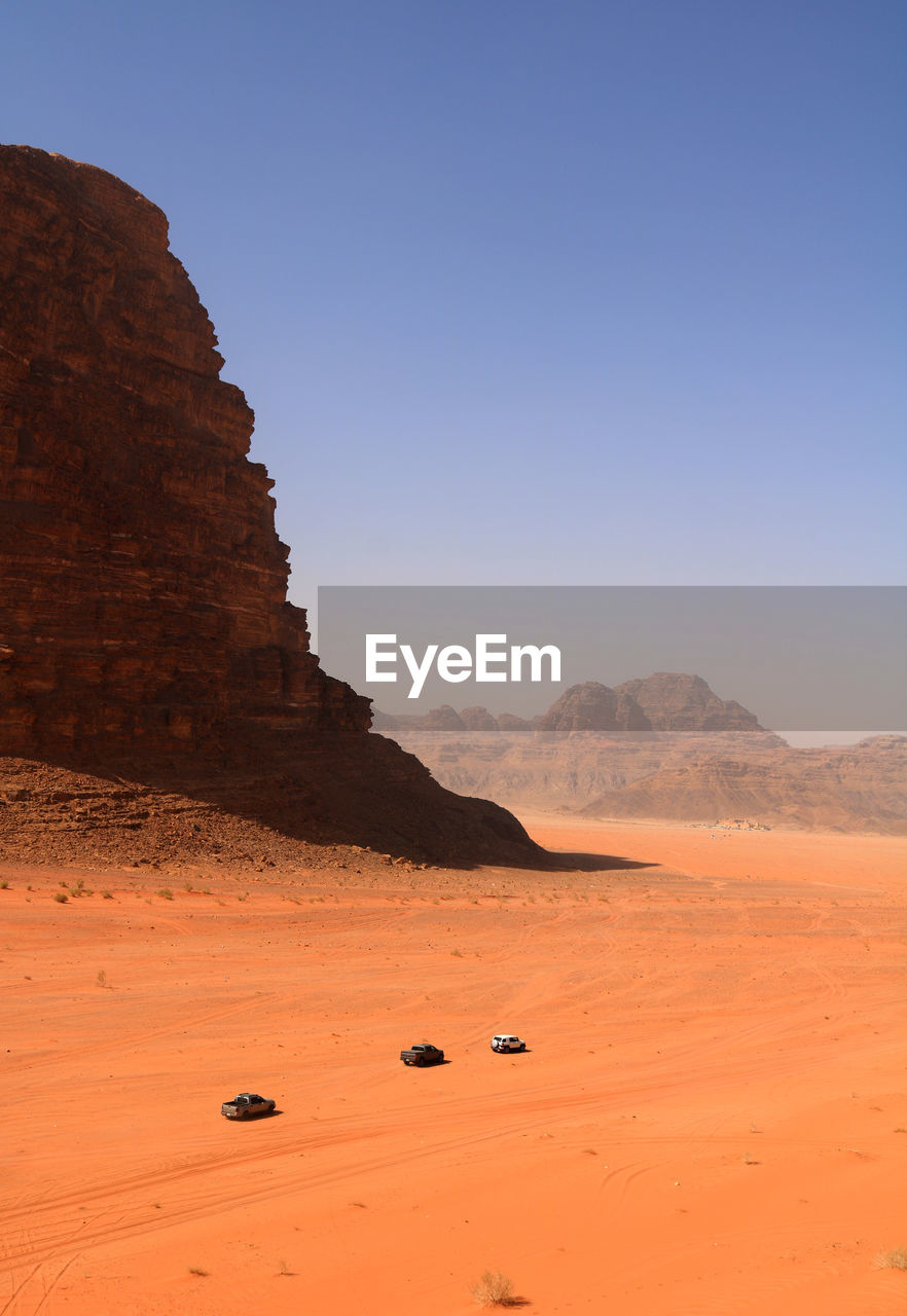 Rock formations in desert against sky