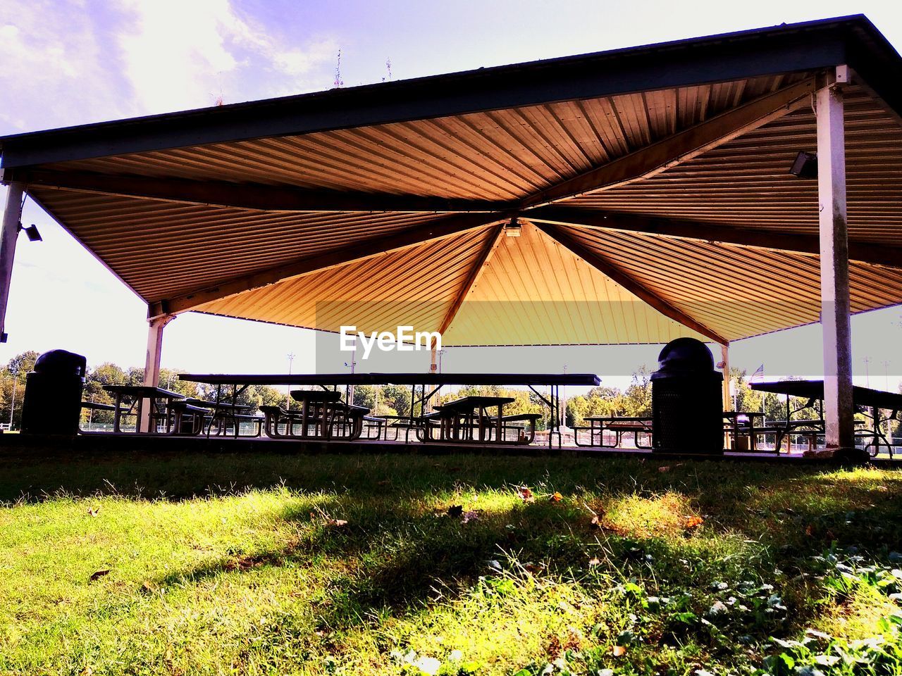 SILHOUETTE OF BUILDING WITH TREES AGAINST SKY