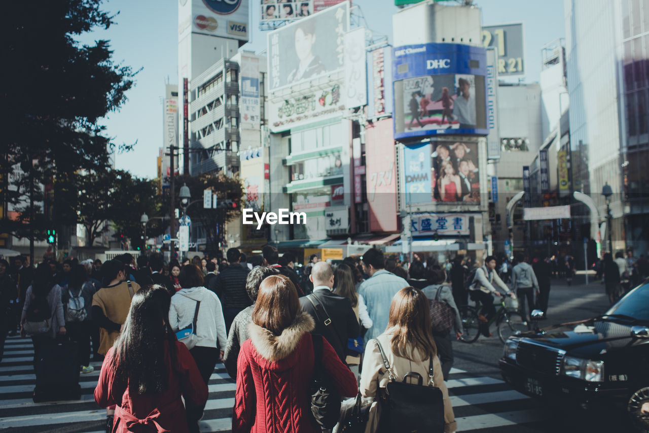 Crowd crossing the street