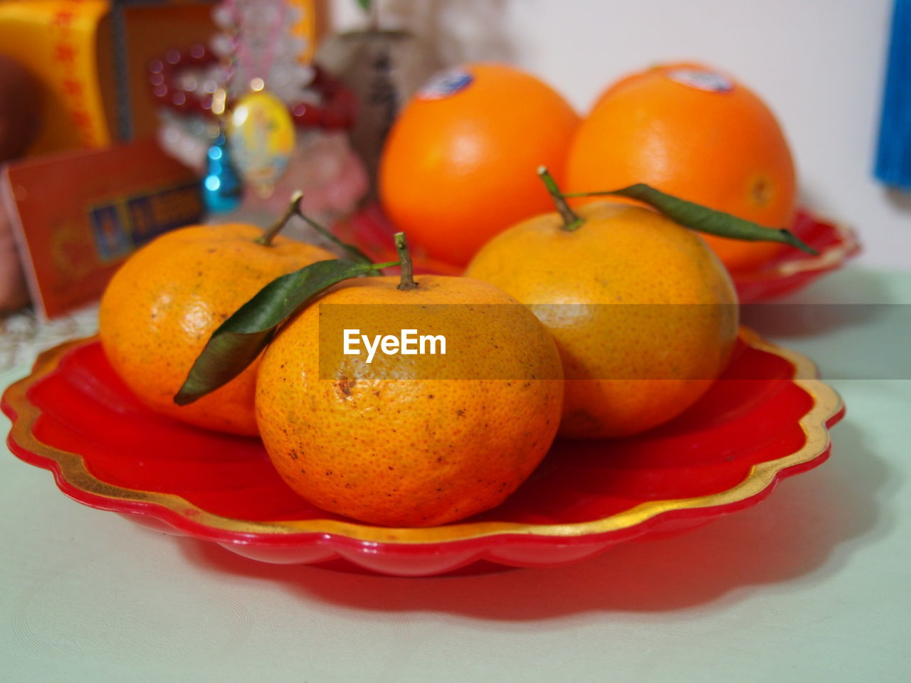 food, food and drink, tangerine, clementine, fruit, healthy eating, produce, plant, orange, orange color, wellbeing, freshness, citrus, citrus fruit, no people, indoors, yellow, grapefruit, blood orange, focus on foreground, table