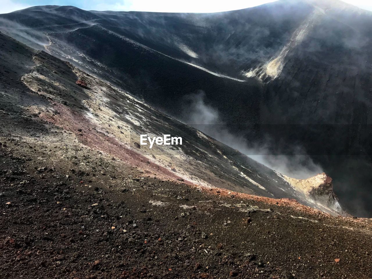 Steam emitting from volcanic craters