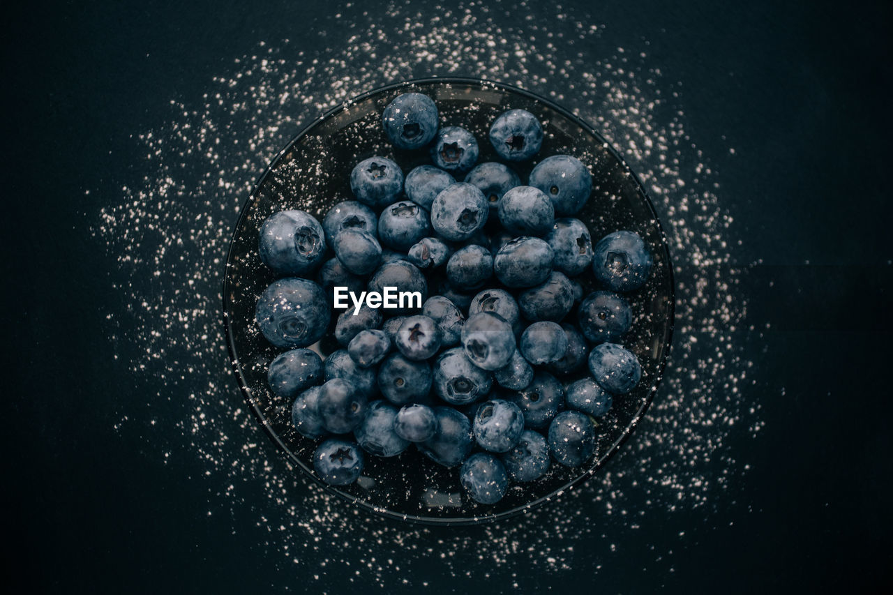 High angle view of blueberries in bowl