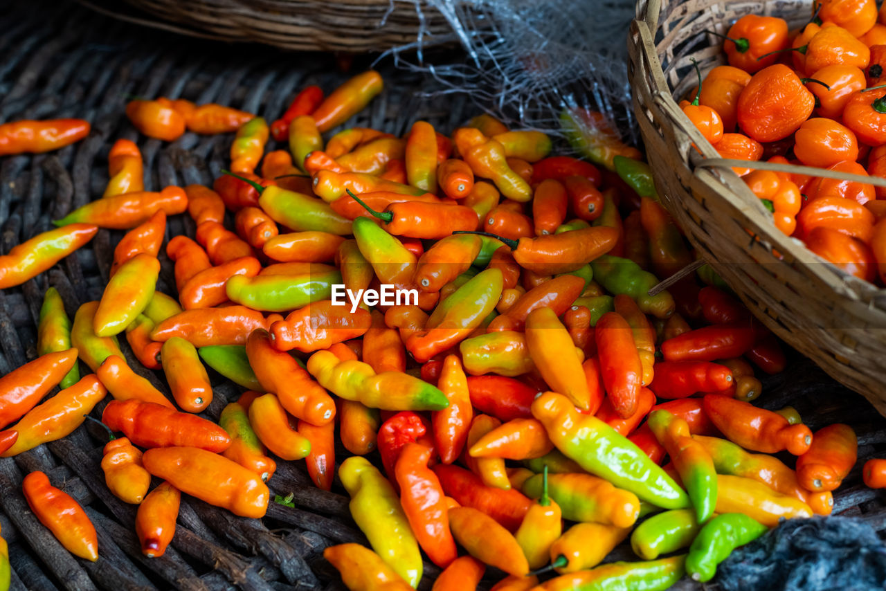 Yellow smelling pepper for sale at the famous and grandiose são joaquim fair in salvador, brazil.