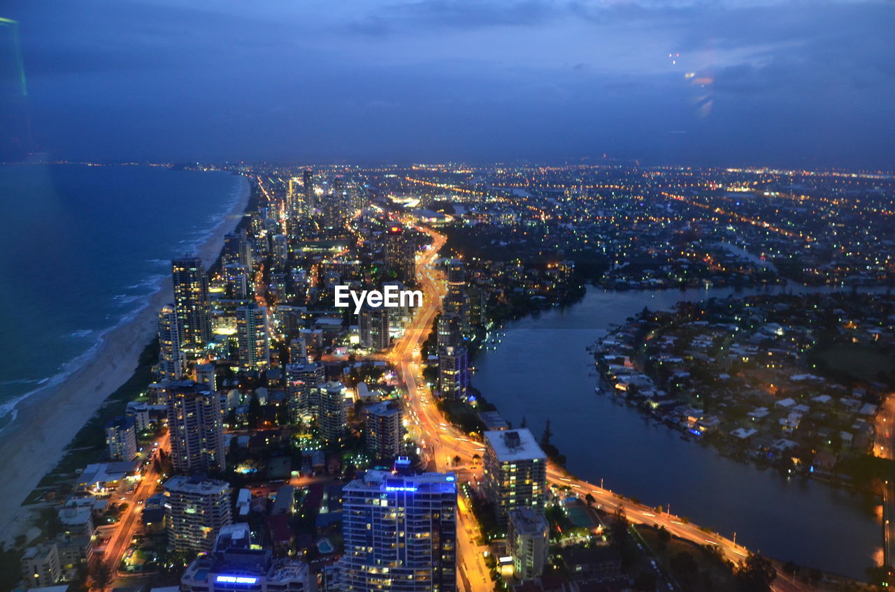 High angle view of illuminated city buildings