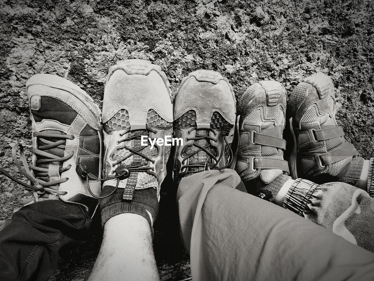 LOW SECTION OF PEOPLE WEARING SHOES