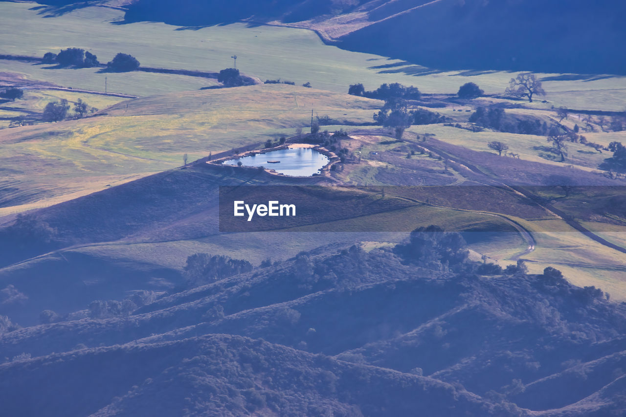 HIGH ANGLE VIEW OF LAND AND MOUNTAIN