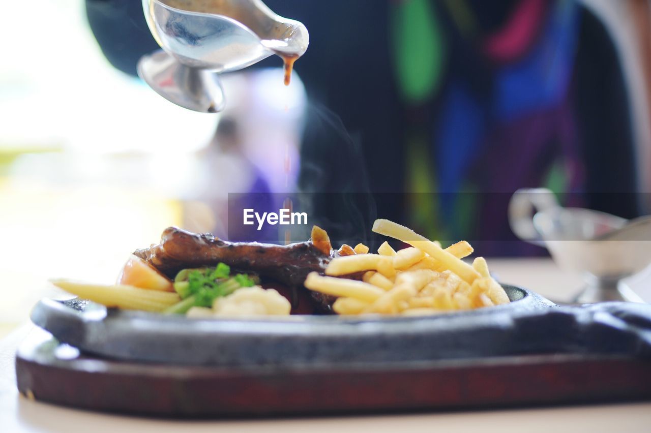 Dinner served in plate on table