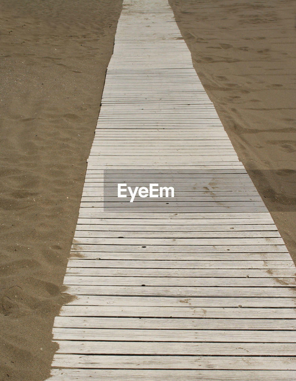 Boardwalk in sand
