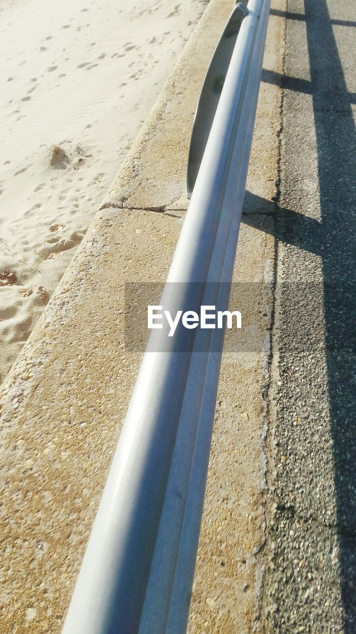 HIGH ANGLE VIEW OF SAND AT BEACH