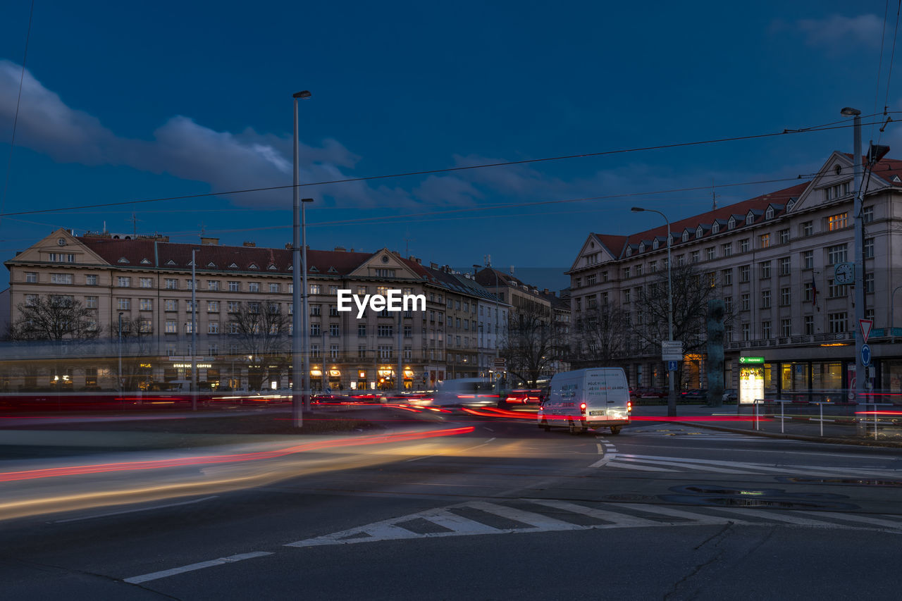 traffic on street against sky