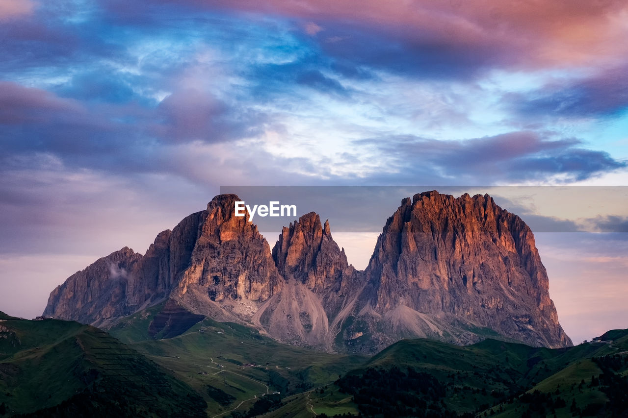 Scenic view of mountains against sky during sunset