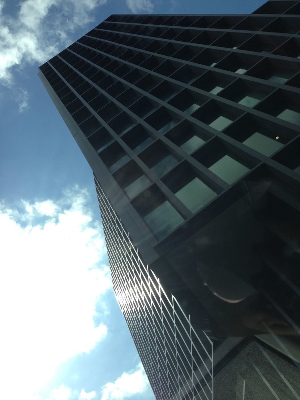 LOW ANGLE VIEW OF OFFICE BUILDING AGAINST SKY