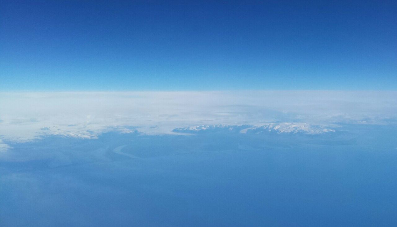 AERIAL VIEW OF CLOUDS OVER SEA