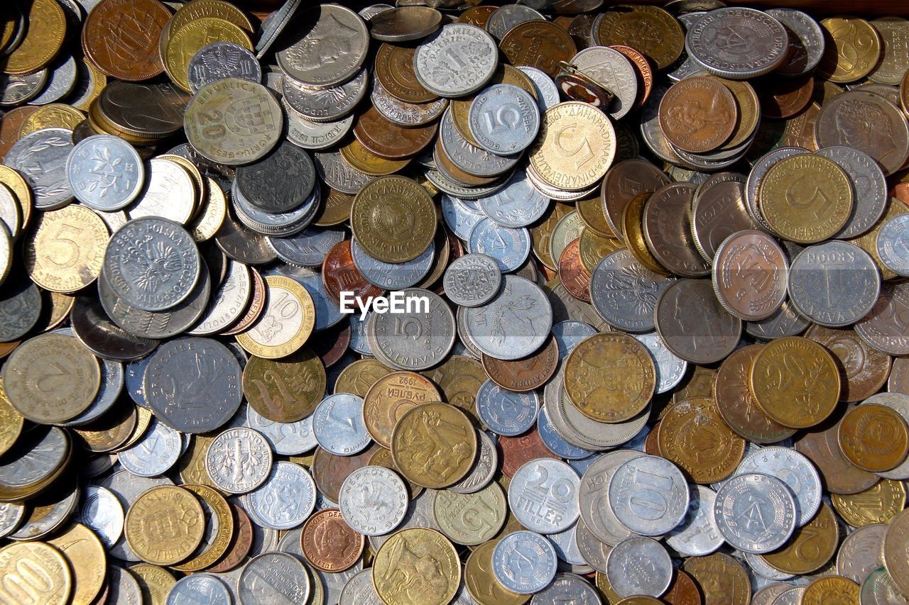 High angle view of coins on table