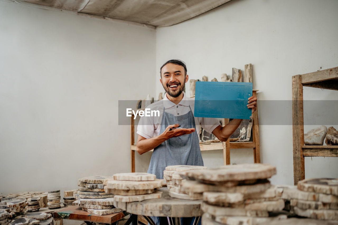 portrait of man working on table