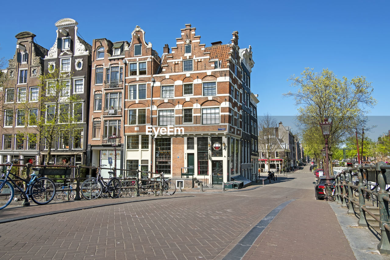 Medieval facades along the canal in the jordaan in amsterdam the netherlands