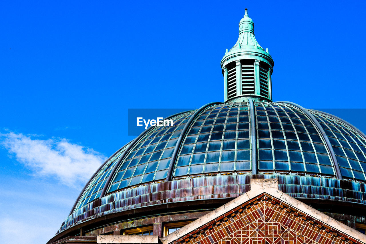 LOW ANGLE VIEW OF TOWER AGAINST BLUE SKY