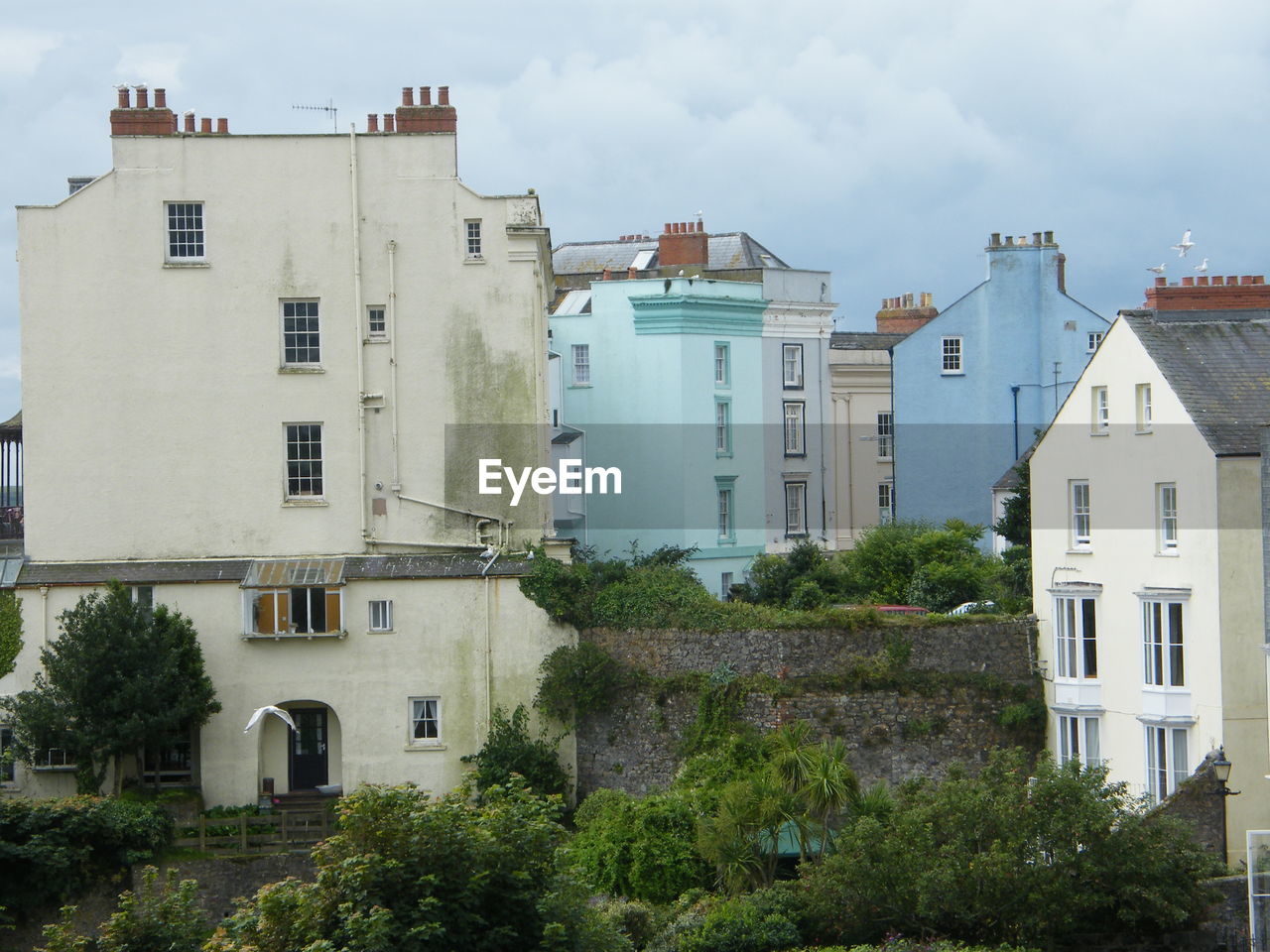 HOUSES AGAINST SKY