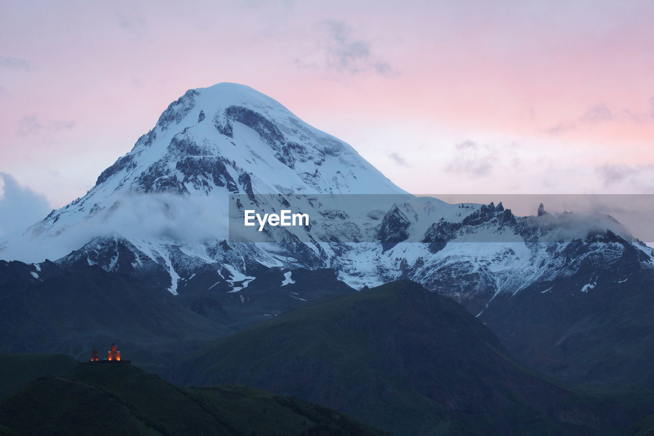 SNOWCAPPED MOUNTAINS AGAINST SKY