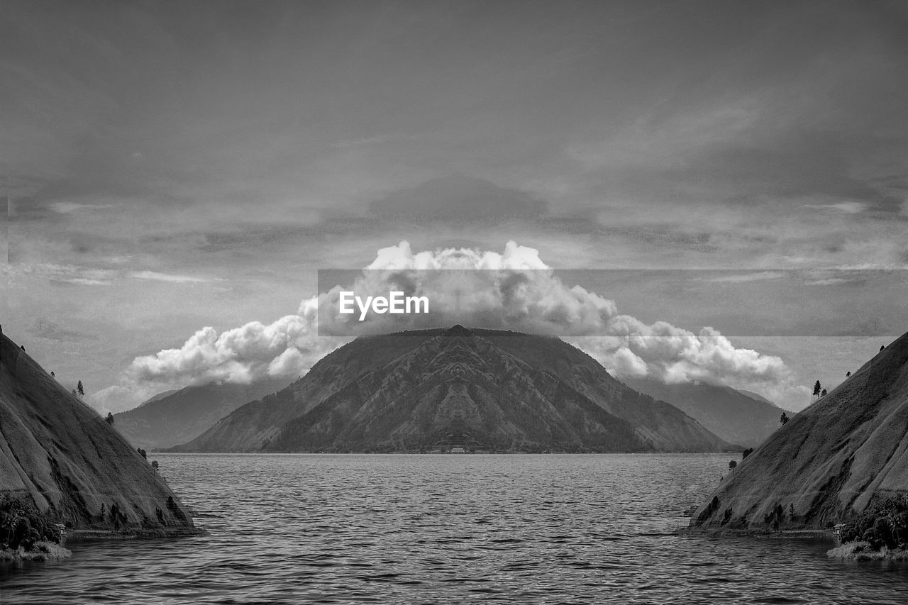 Scenic view of volcanic mountain against sky