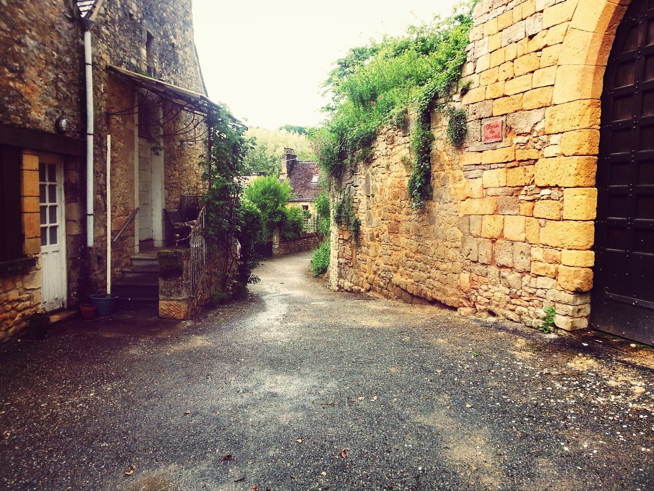 Narrow street in old town with stone houses