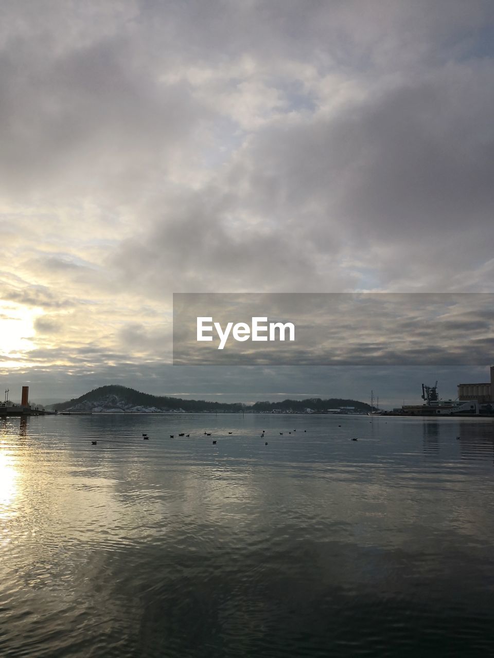 Scenic view of sea against sky at sunset