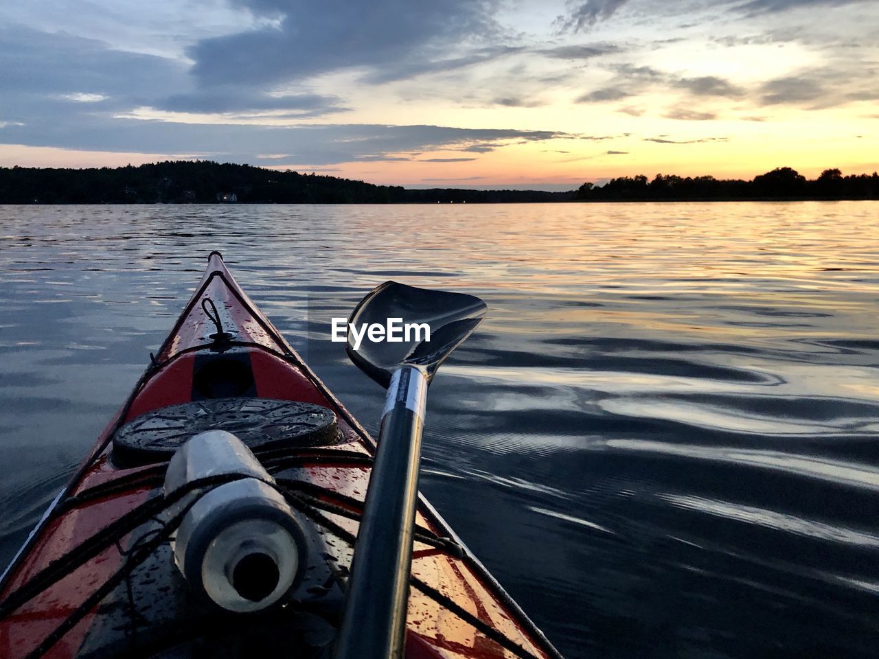 Scenic view of lake mälaren against sky during sunset. summer night.