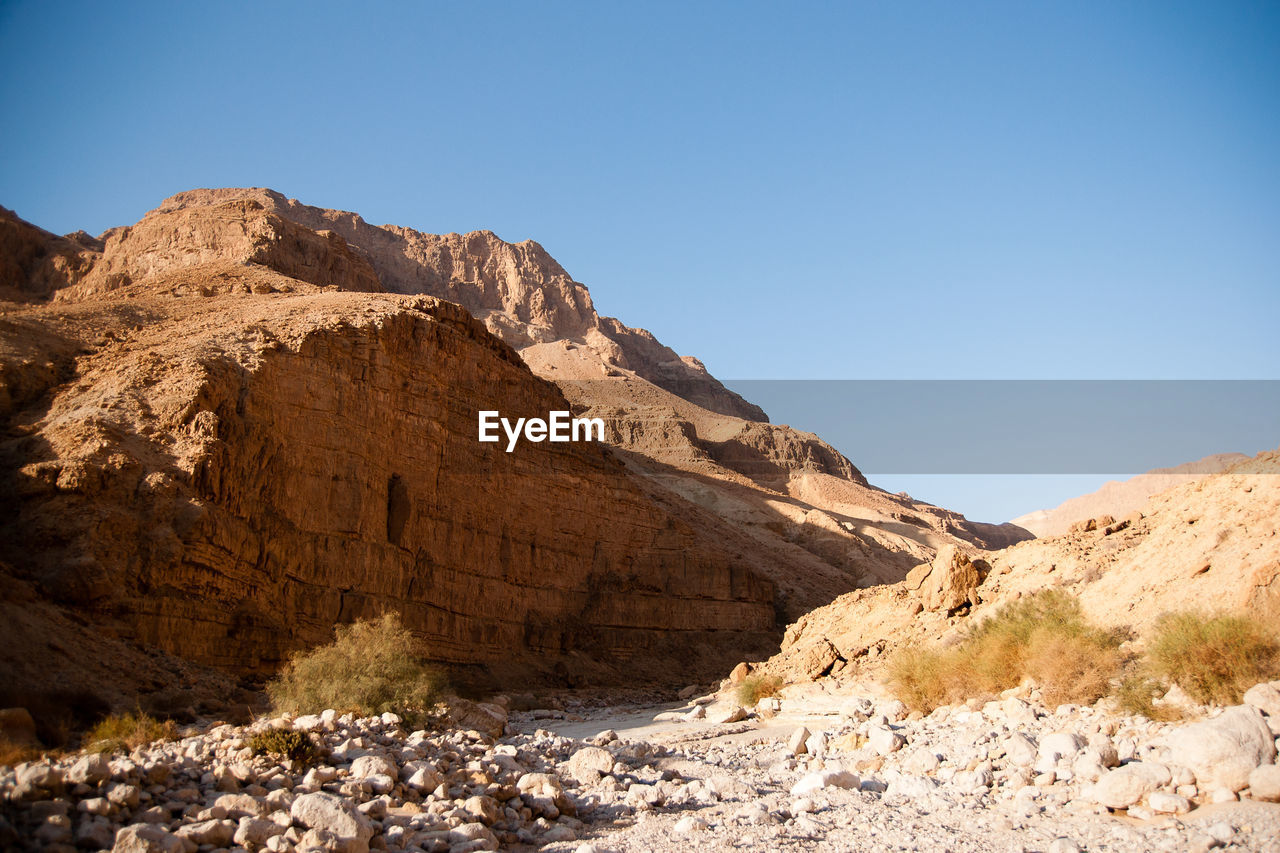 Scenic view of mountains against clear sky