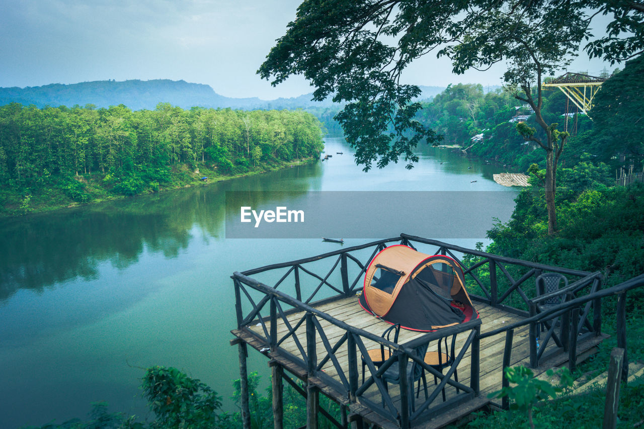 Scenic view of lake against mountain.