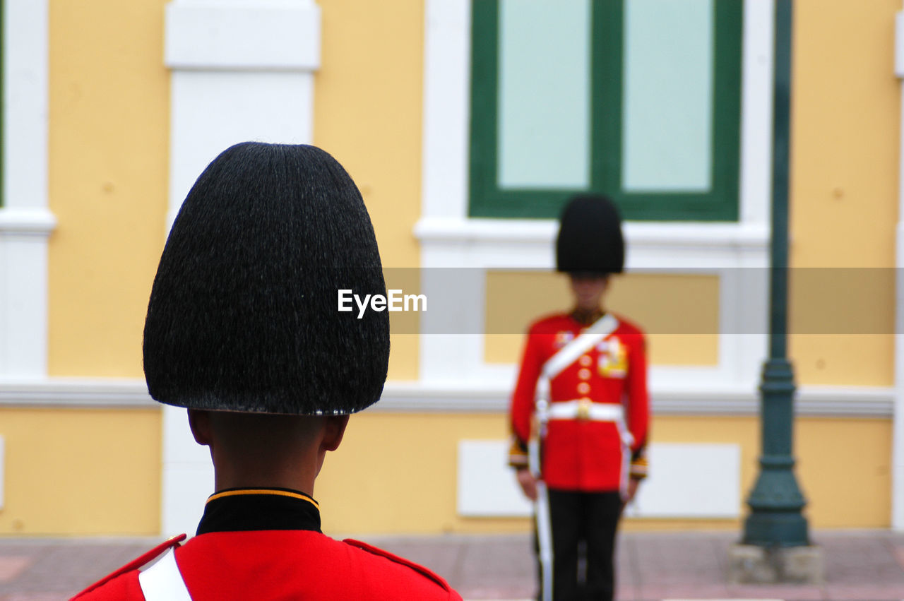 British royal guards standing against building