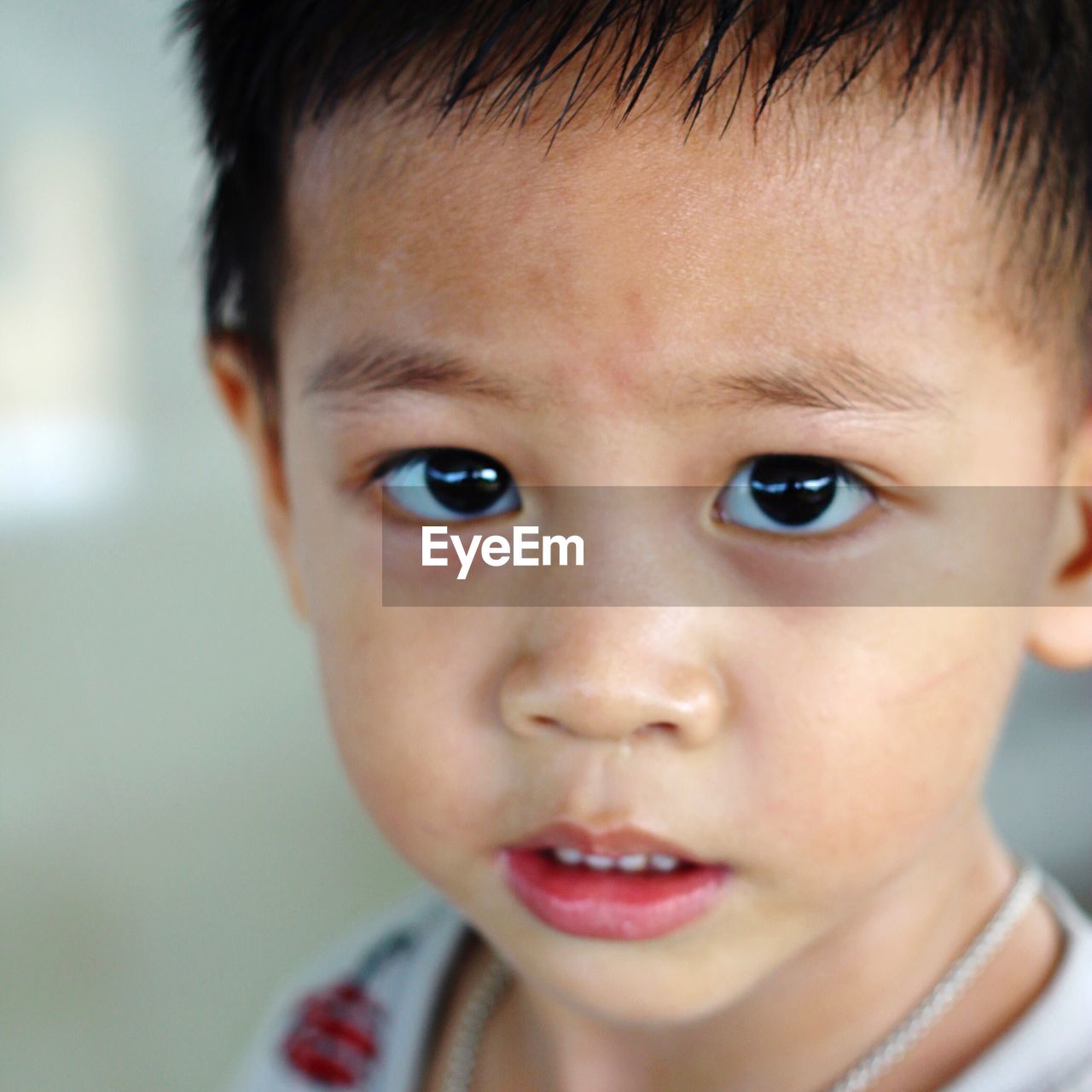 CLOSE-UP PORTRAIT OF BOY