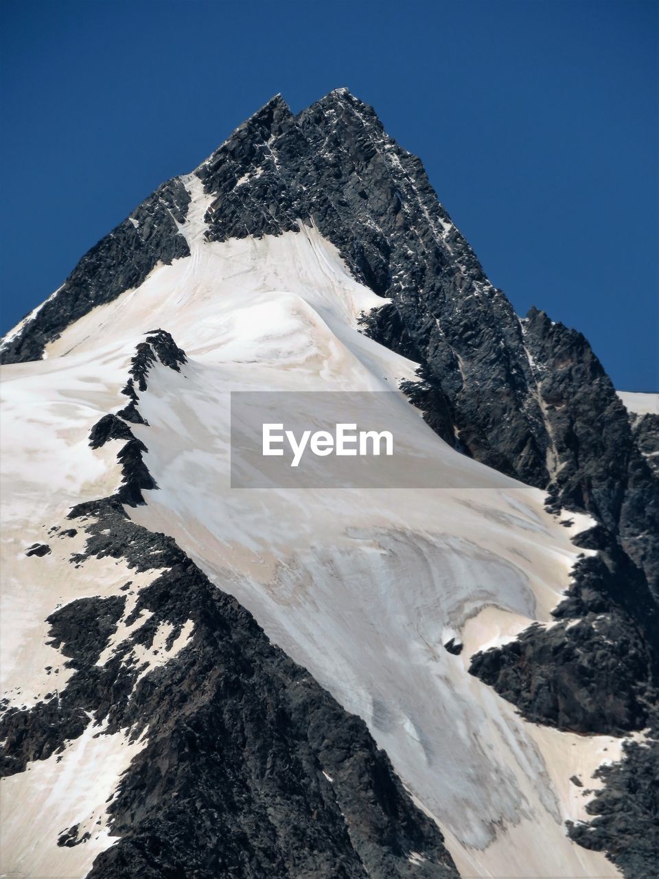 Scenic view of snow covered mountain