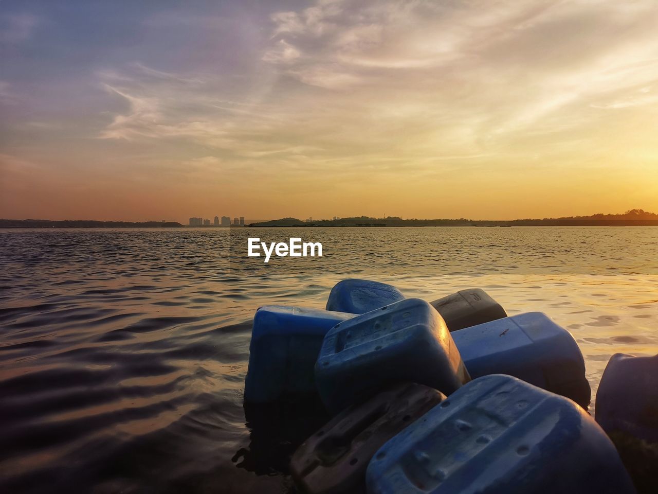 SCENIC VIEW OF SEA DURING SUNSET