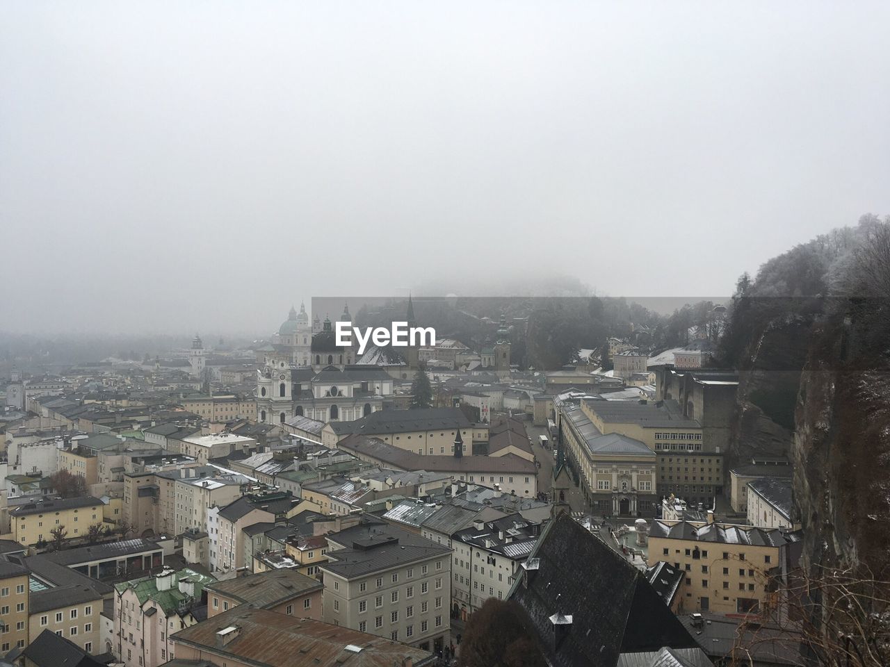 AERIAL VIEW OF CITY AGAINST SKY