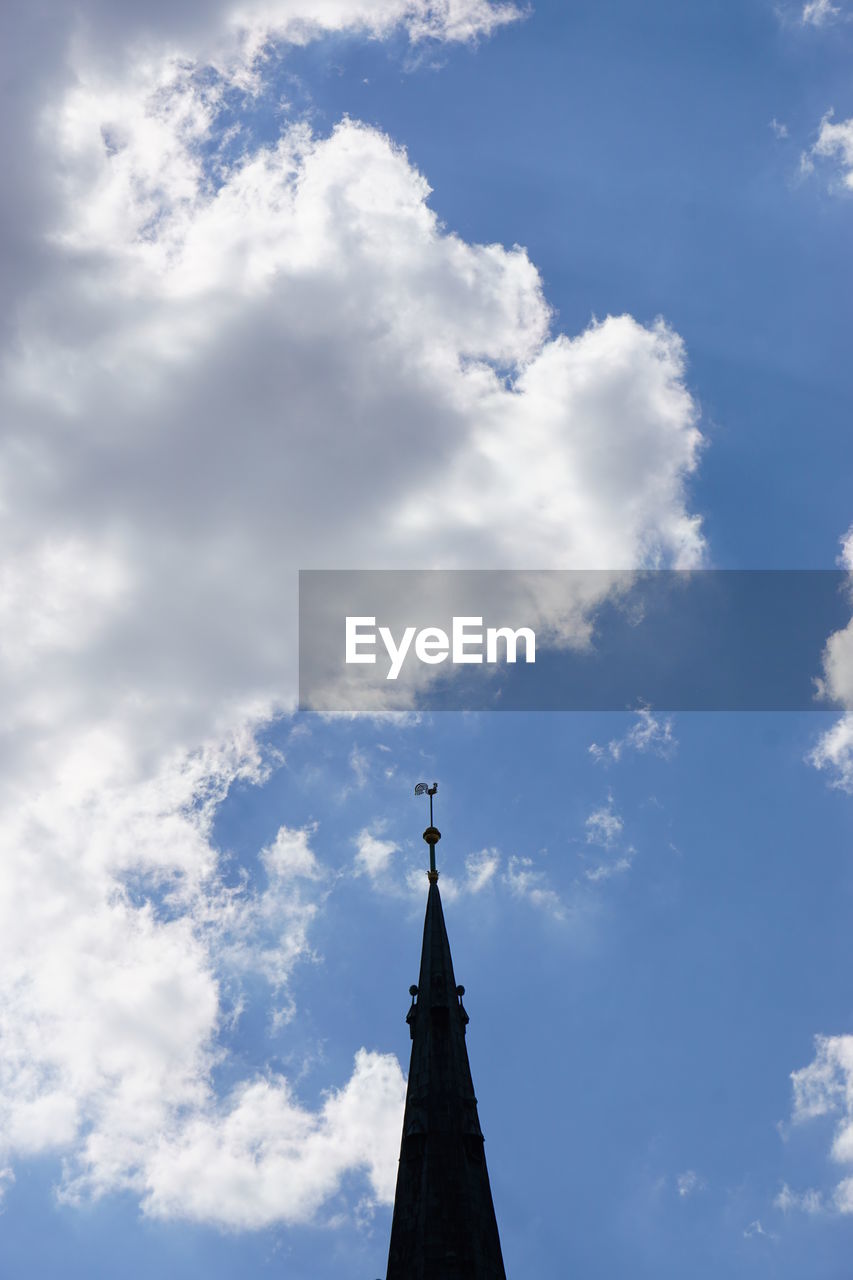 High section of building against cloudy sky