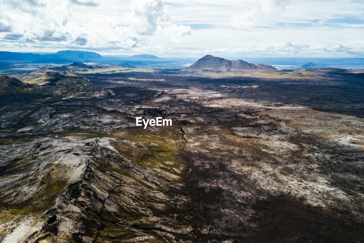 AERIAL VIEW OF LANDSCAPE AND MOUNTAINS